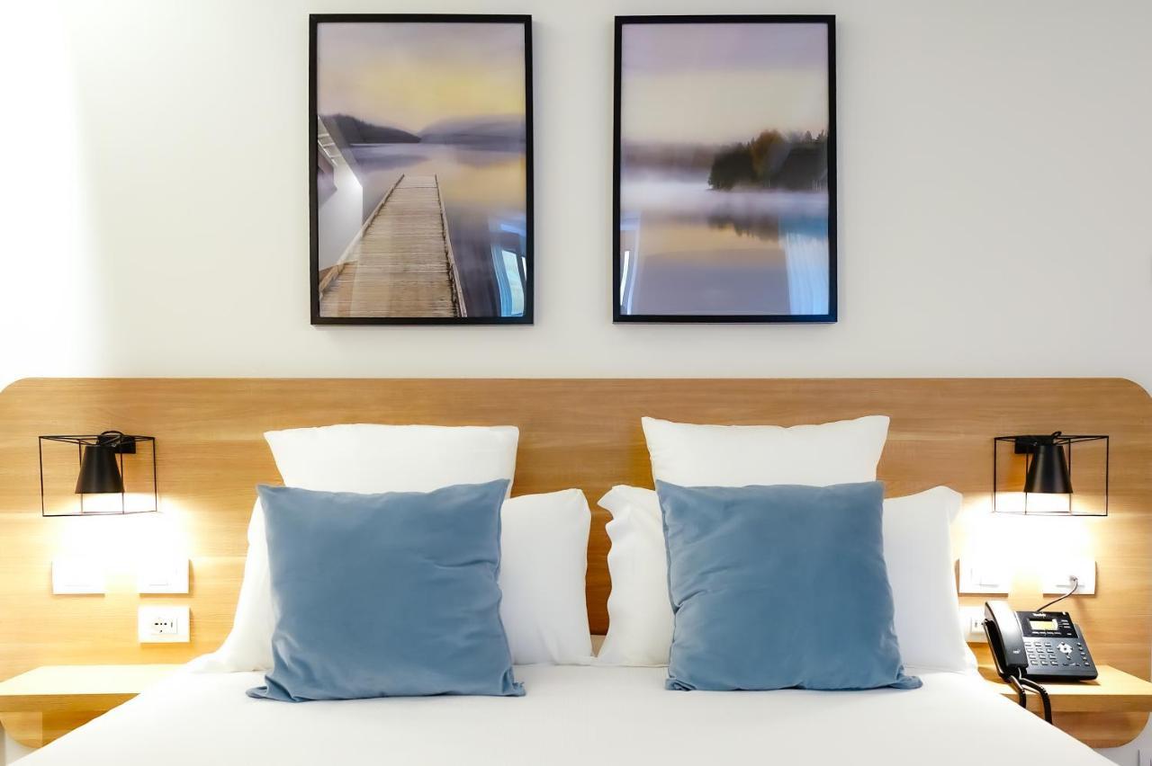 แบร์กาโม อินน์ 15 ภายนอก รูปภาพ A bedroom at the hotel